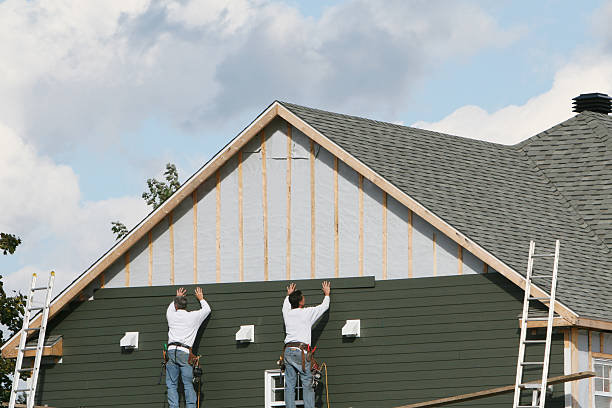 Professional Siding technician working in London, OH